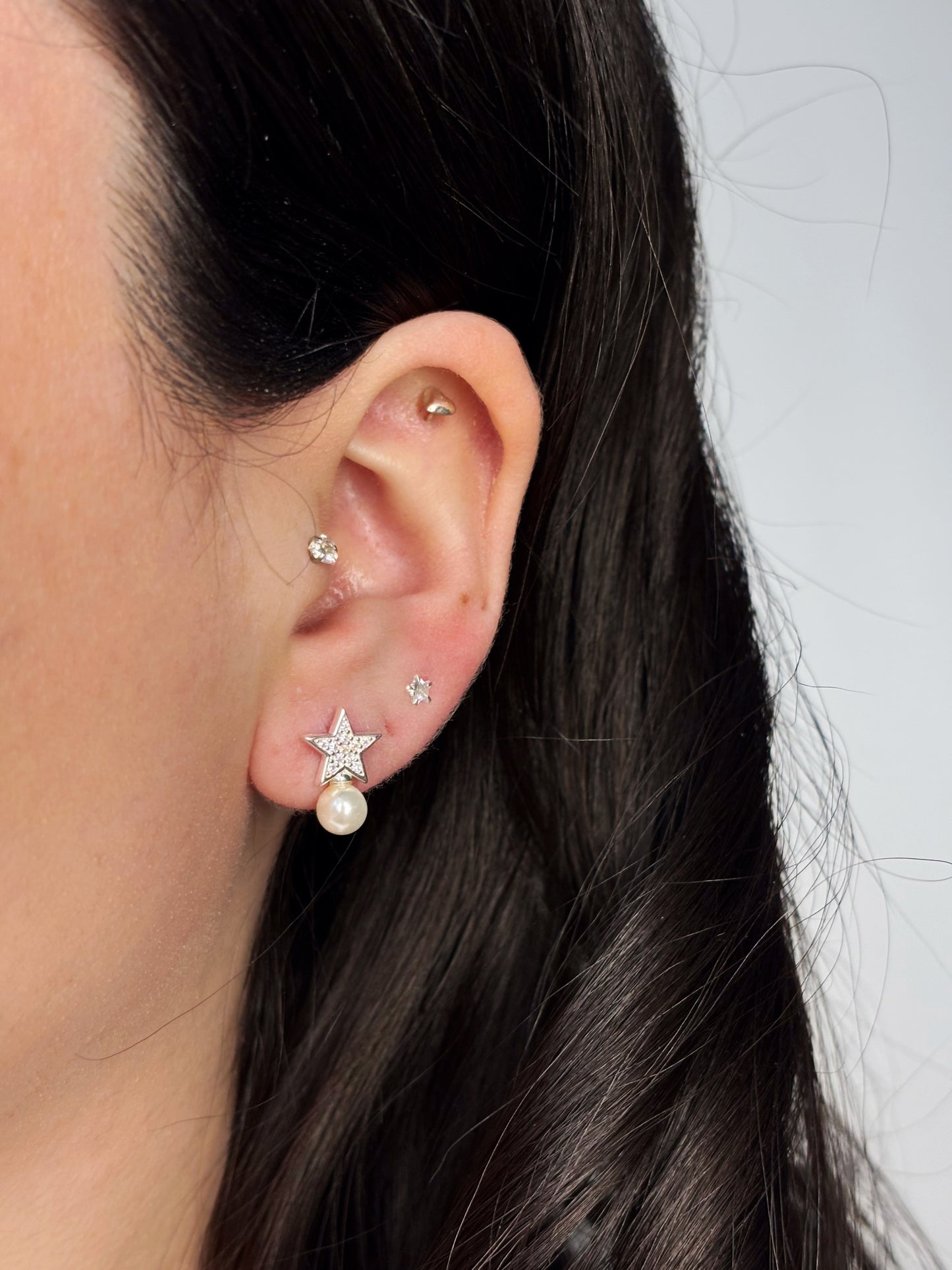 Aros estrella microcircones con perla