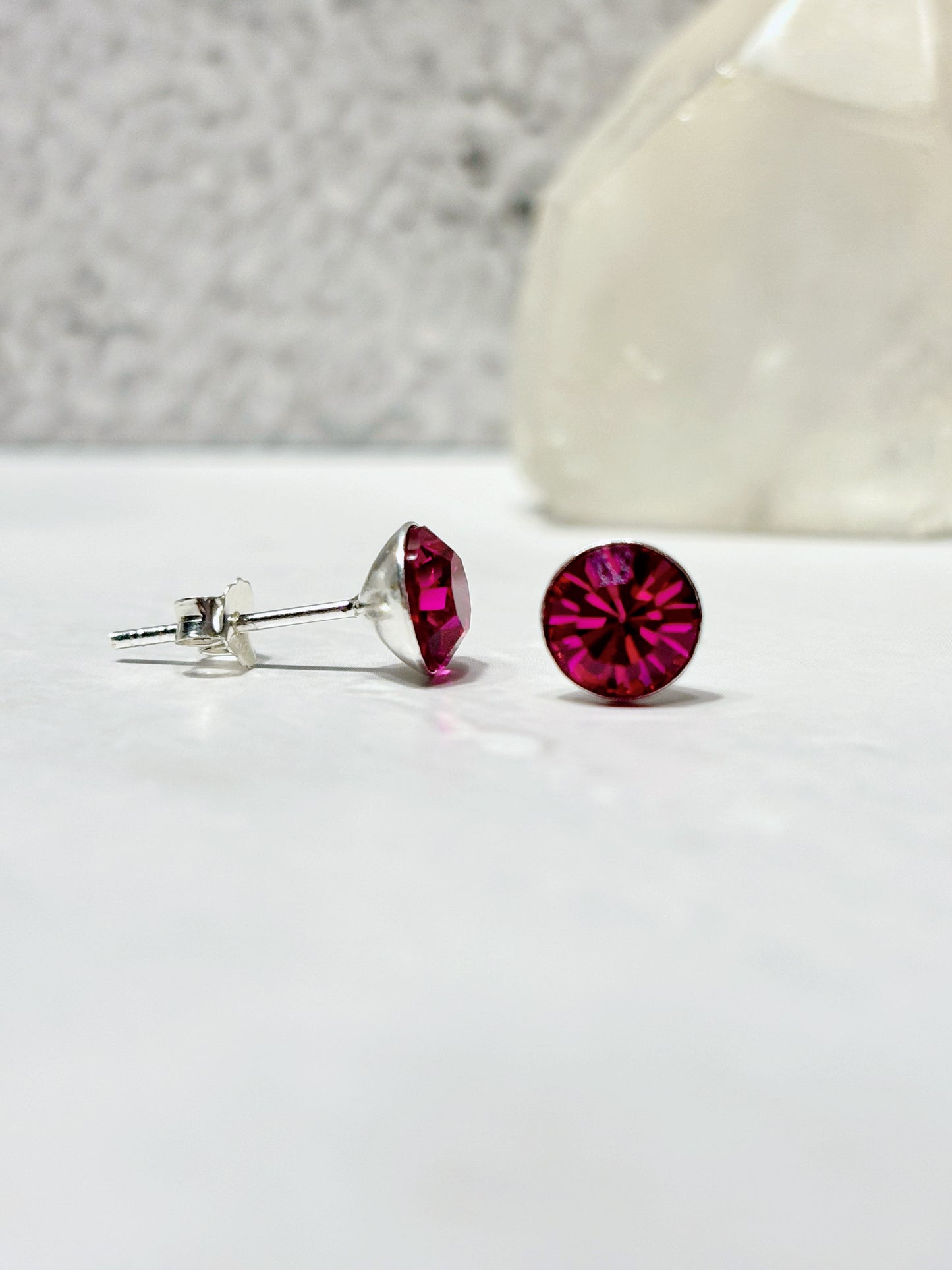 Aros circón fucsia