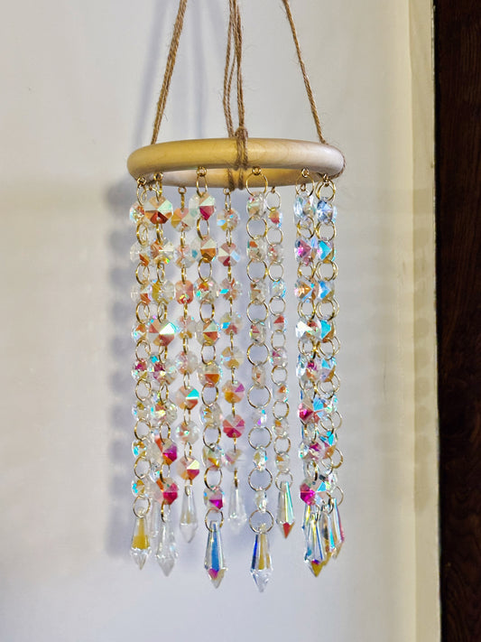 Atrapasol madera cristales