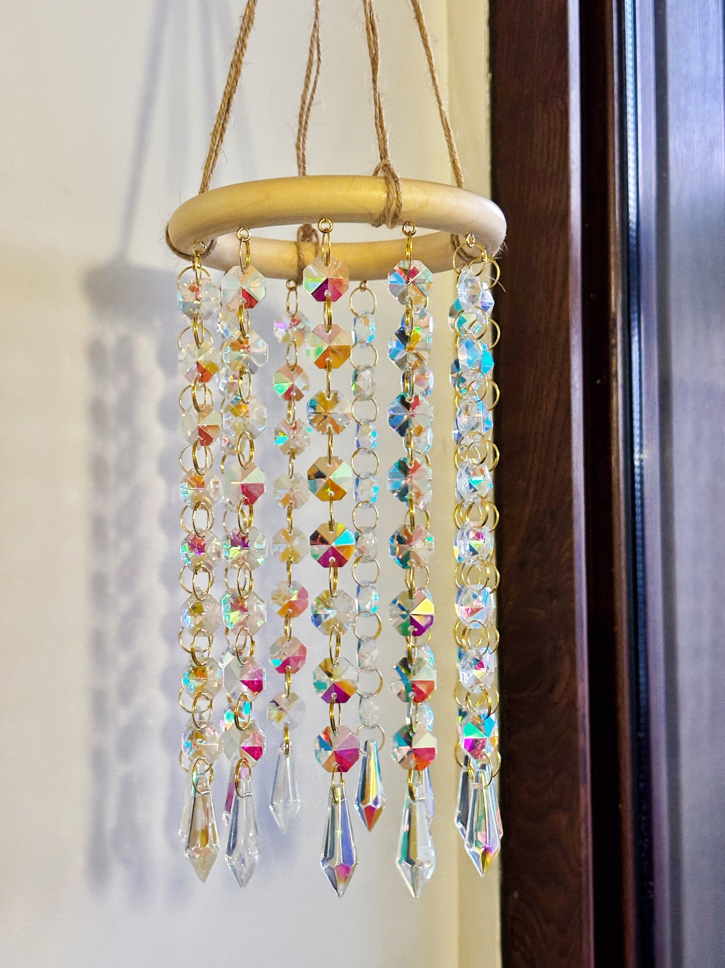 Atrapasol madera cristales