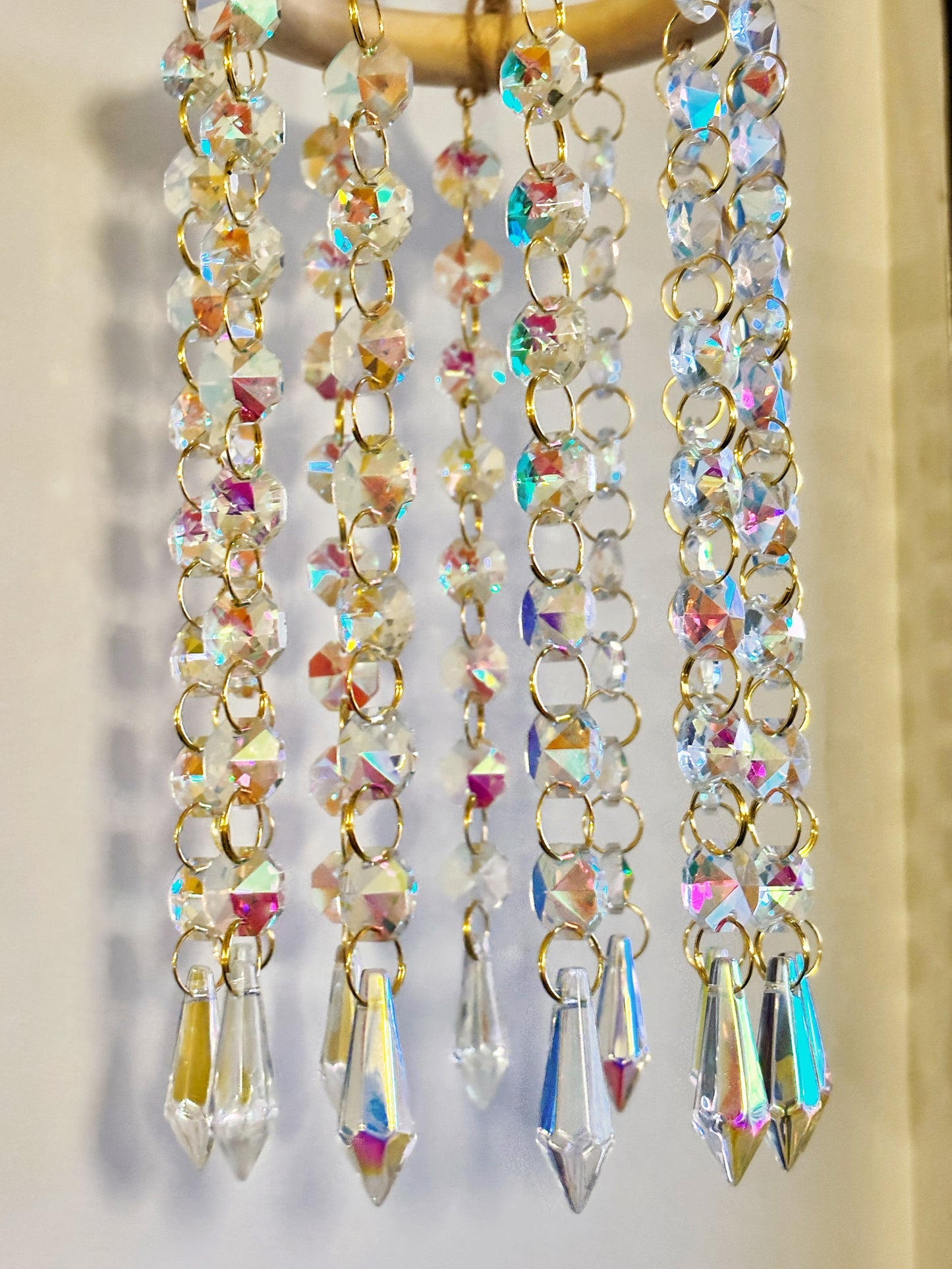 Atrapasol madera cristales