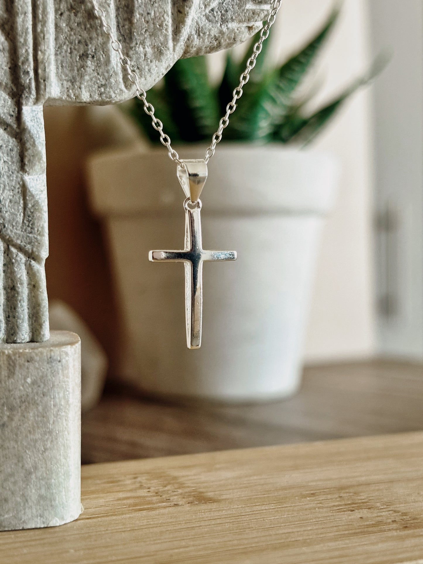 Collar cruz curva lisa