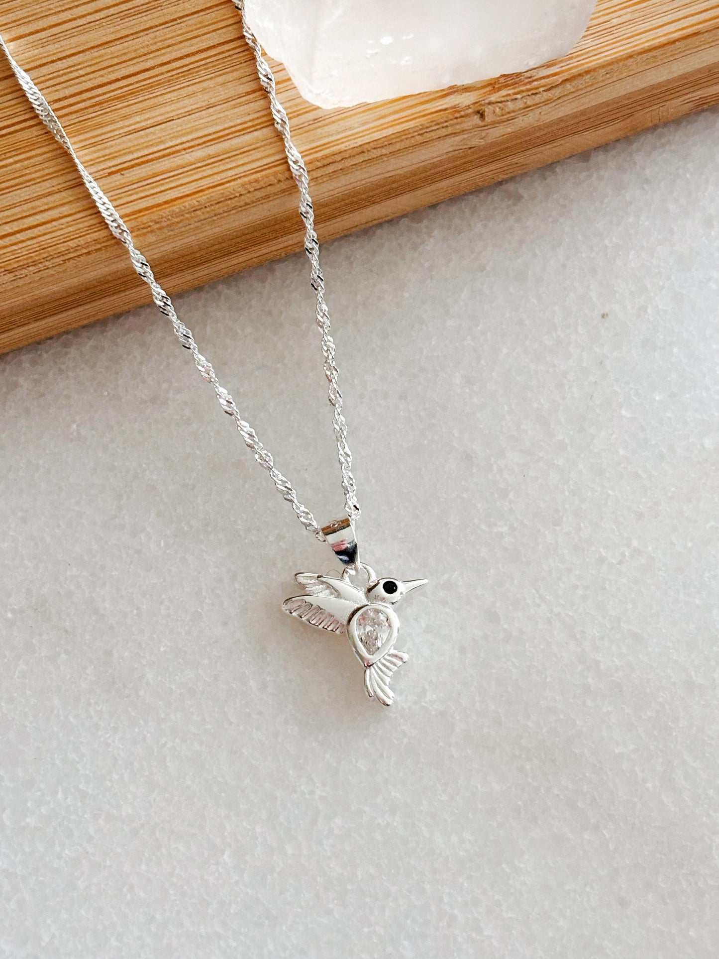 Conjunto colibrí con circón