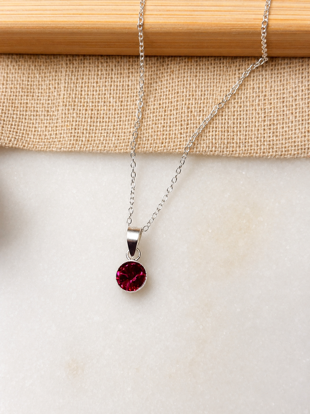 Collar punto de luz Fucsia