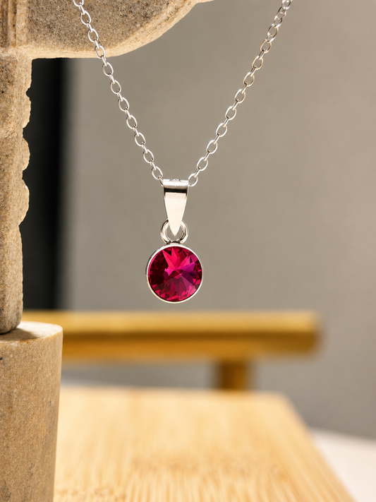 Collar punto de luz Fucsia