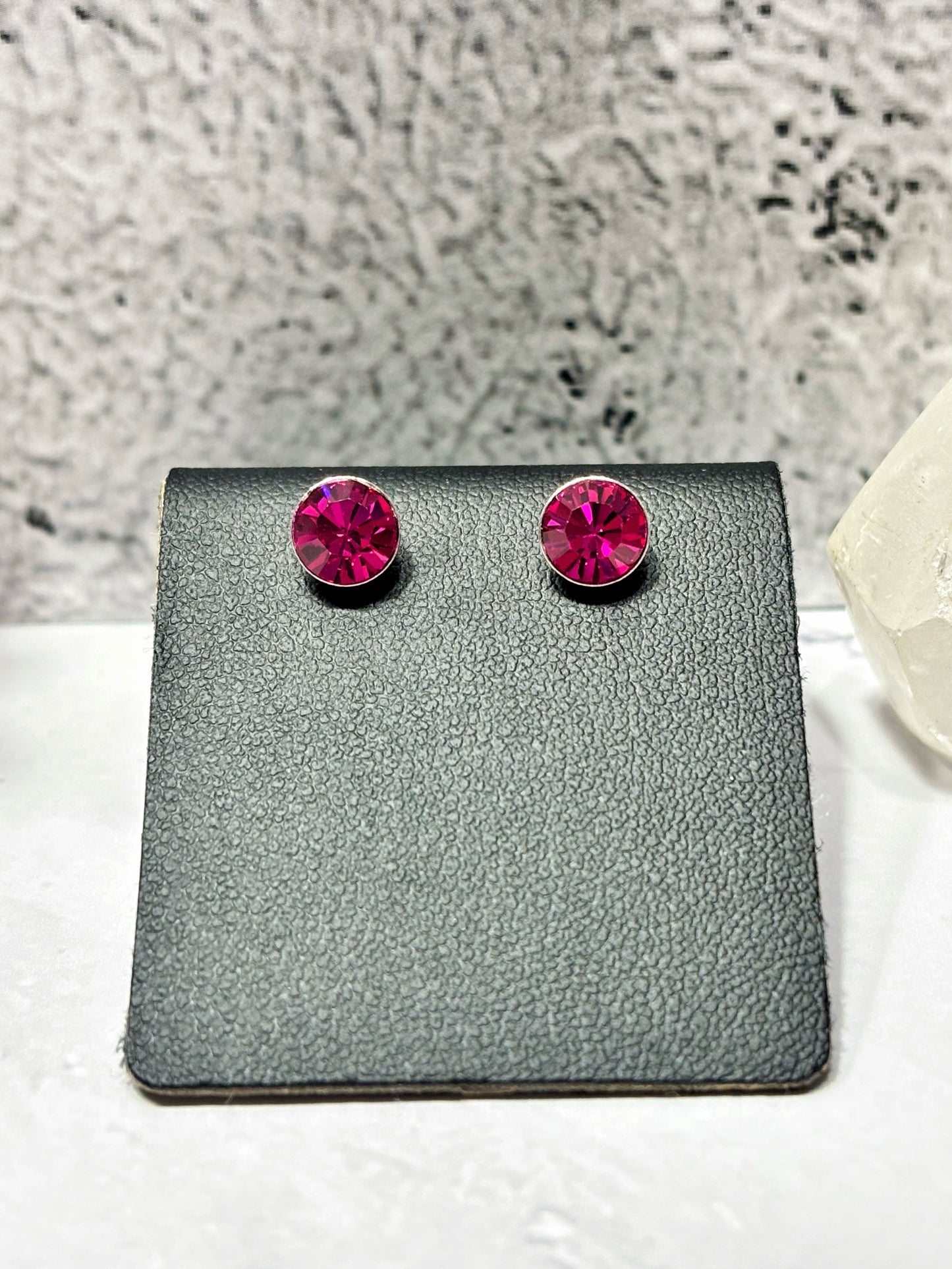 Aros circón fucsia